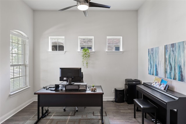 office with baseboards, wood finished floors, and ceiling fan