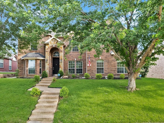 1803 Timber Ridge Dr, Frisco, TX 75036 - view of front of property with a front lawn and brick siding