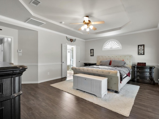 1803 Timber Ridge Dr, Frisco, TX 75036 - bedroom with a raised ceiling, dark wood-style floors, baseboards, a ceiling fan, and ornamental molding