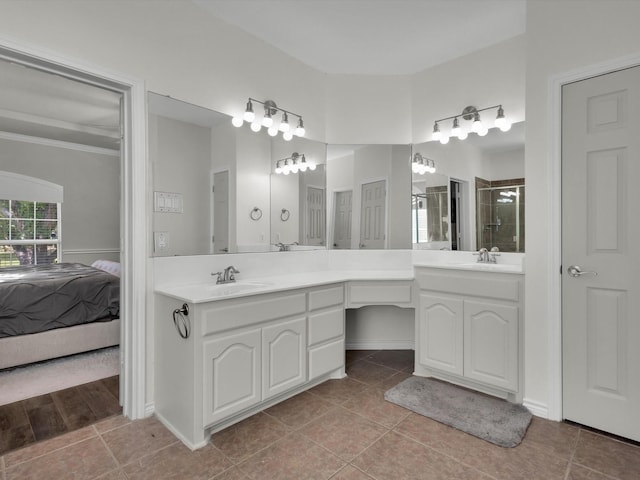 1803 Timber Ridge Dr, Frisco, TX 75036 - ensuite bathroom with tile patterned flooring, a stall shower, and vanity