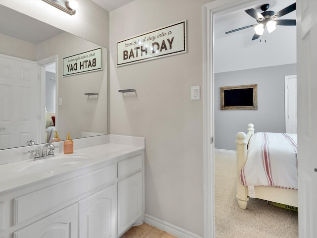 1803 Timber Ridge Dr, Frisco, TX 75036 - ensuite bathroom featuring ceiling fan, vanity, and baseboards