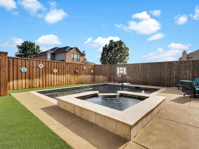 1803 Timber Ridge Dr, Frisco, TX 75036 - view of pool featuring a fenced backyard, a patio area, and a pool with connected hot tub