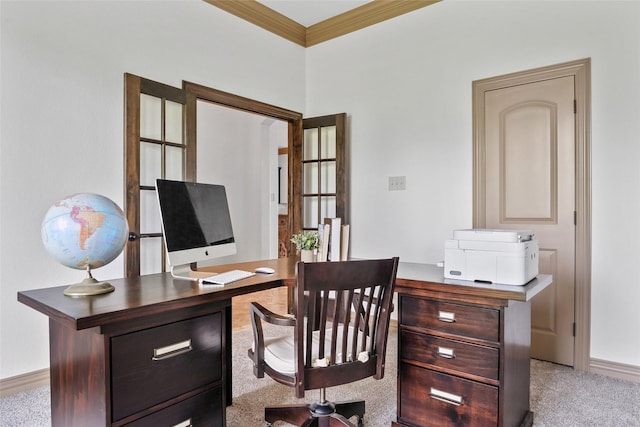 home office with crown molding, carpet flooring, and baseboards