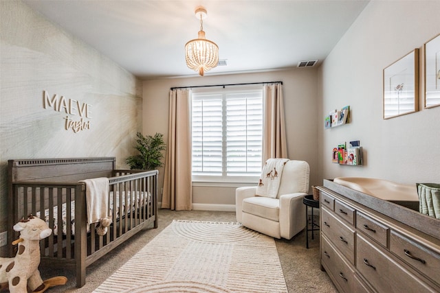 4011 Hollywood Park Ct, Celina, TX 75009 - bedroom with a chandelier, carpet floors, a crib, and baseboards