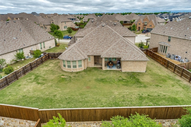 4011 Hollywood Park Ct, Celina, TX 75009 - rear view of house with a patio, a residential view, and brick siding