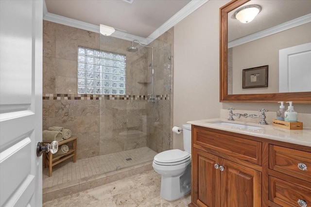bathroom with ornamental molding, toilet, a walk in shower, and vanity