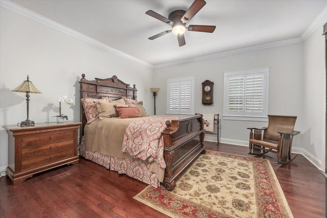 bedroom with dark wood finished floors, ornamental molding, baseboards, and a ceiling fan