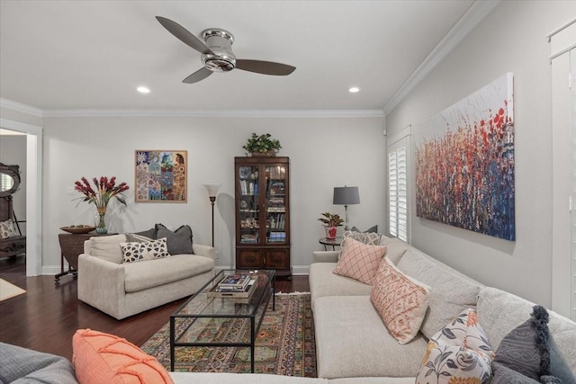 living area with a ceiling fan, wood finished floors, ornamental molding, recessed lighting, and baseboards