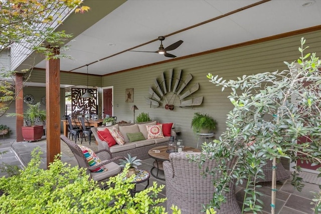 view of patio featuring an outdoor hangout area, ceiling fan, and outdoor dining area