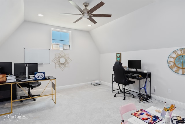 carpeted home office with lofted ceiling, baseboards, and ceiling fan
