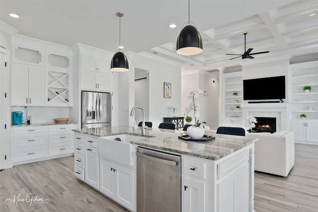 kitchen with recessed lighting, stainless steel appliances, a ceiling fan, a sink, and beam ceiling