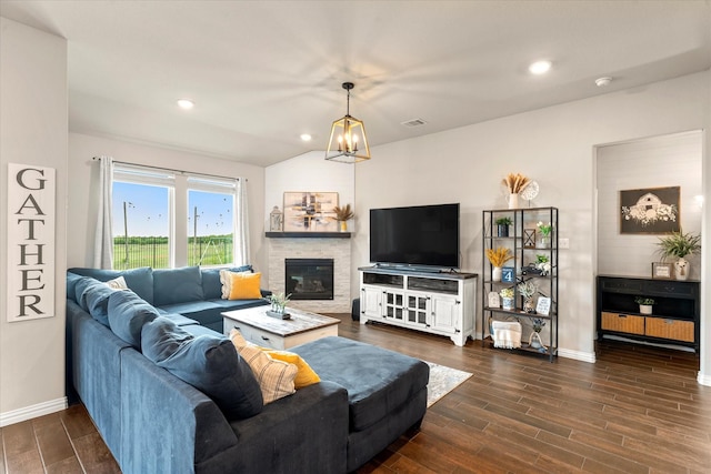 3912 Burks Ct, Celina, TX 75009 - living room featuring baseboards, a stone fireplace, dark wood finished floors, a chandelier, and recessed lighting
