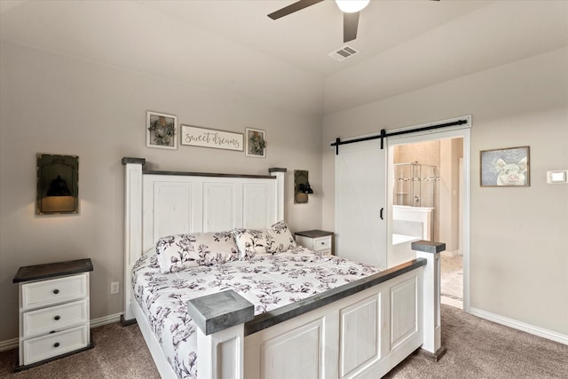 3912 Burks Ct, Celina, TX 75009 - bedroom with dark colored carpet, a barn door, baseboards, and a ceiling fan