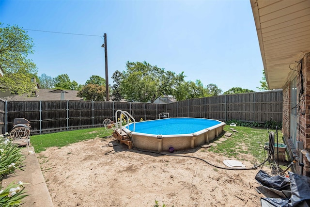 view of pool with a fenced in pool and a fenced backyard