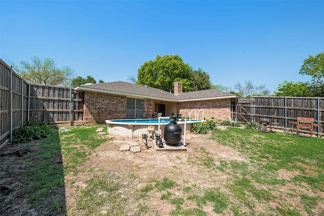 view of yard with a fenced backyard and a fenced in pool