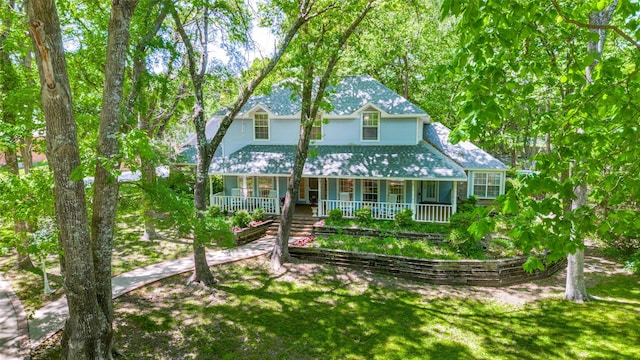 300 Dove Crk, Mckinney, TX 75071 - view of front of home with a porch and a front lawn