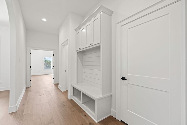 737 Burr Oak Ln, Weatherford, TX 76085 - mudroom with recessed lighting, light wood-style floors, and baseboards