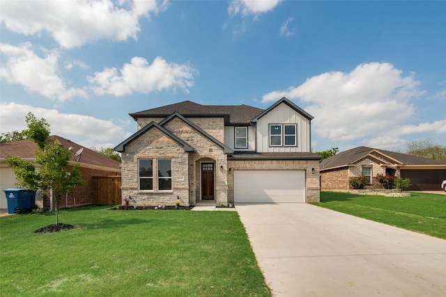 6810 Windward View Dr, Rowlett, TX 75088 - view of front facade featuring driveway, a garage, a front lawn, stone siding, and board and batten siding