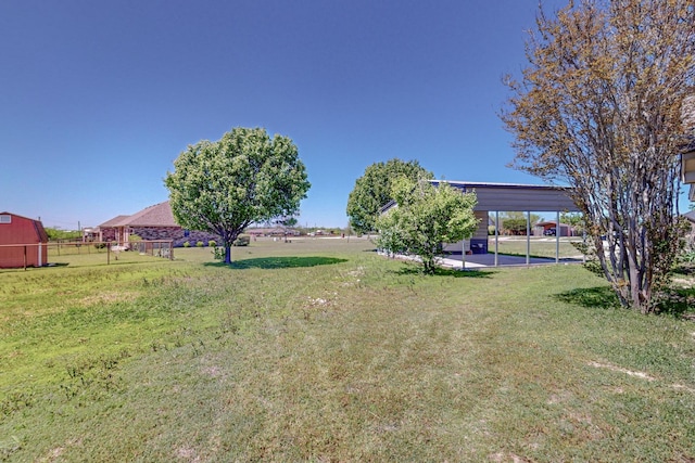 231 Dove Hill Ln, Weatherford, TX 76088 - view of yard featuring a detached carport and fence