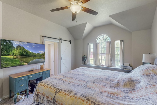 231 Dove Hill Ln, Weatherford, TX 76088 - carpeted bedroom featuring a barn door, vaulted ceiling, and ceiling fan