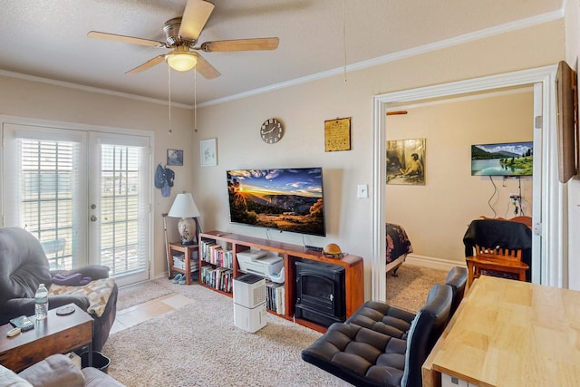 231 Dove Hill Ln, Weatherford, TX 76088 - carpeted living area featuring a ceiling fan, a textured ceiling, attic access, baseboards, and ornamental molding