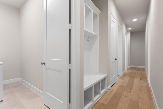 mudroom with visible vents, light wood-style flooring, baseboards, and recessed lighting