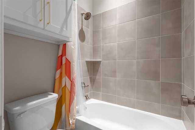 bathroom with toilet and shower / bathtub combination with curtain