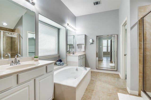 5220 Grove Cove Dr, Mckinney, TX 75071 - bathroom featuring a shower stall, tile patterned flooring, a sink, and visible vents
