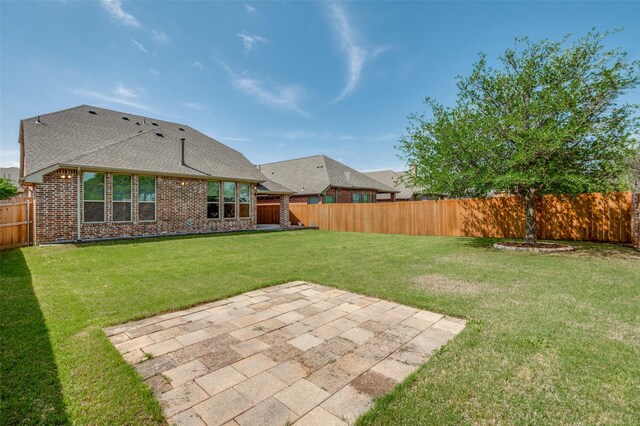 5220 Grove Cove Dr, Mckinney, TX 75071 - view of yard featuring a fenced backyard and a patio area