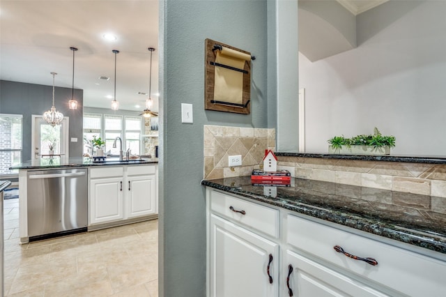 5220 Grove Cove Dr, Mckinney, TX 75071 - kitchen with a sink, dark stone countertops, backsplash, white cabinetry, and dishwasher