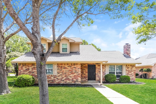 1 Roaring Creek Ct, Trophy Club, TX 76262 - view of front of property with brick siding, a shingled roof, and a front lawn