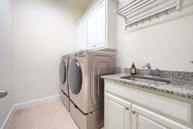 996 Heather Falls Dr, Rockwall, TX 75087 - washroom featuring independent washer and dryer, cabinet space, and baseboards