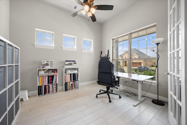 9300 Pecan Woods Trl, Argyle, TX 76226 - office area featuring healthy amount of natural light, baseboards, a ceiling fan, and wood finished floors