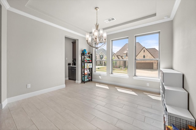 9300 Pecan Woods Trl, Argyle, TX 76226 - unfurnished dining area featuring a chandelier, ornamental molding, a raised ceiling, light wood-style flooring, and baseboards