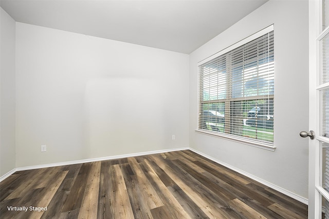 3412 San Lucas Ln, Denton, TX 76208 - empty room featuring dark wood finished floors and baseboards