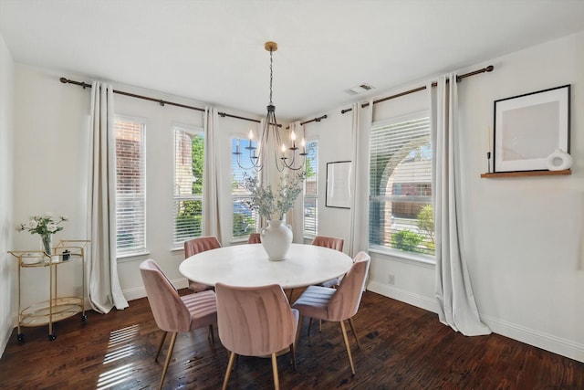 1308 Kittyhawk Dr, Little Elm, TX 75068 - dining space featuring a chandelier, baseboards, healthy amount of natural light, and dark wood finished floors