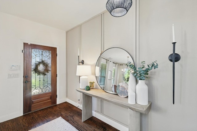 1308 Kittyhawk Dr, Little Elm, TX 75068 - foyer with dark wood-type flooring and baseboards