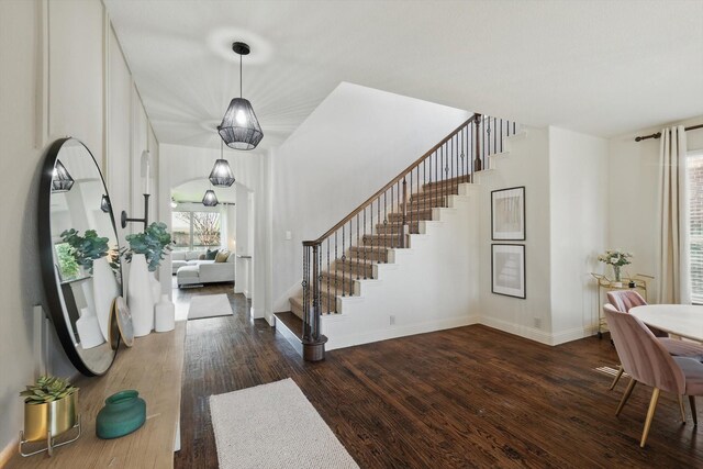 1308 Kittyhawk Dr, Little Elm, TX 75068 - entryway with stairway, wood finished floors, and baseboards