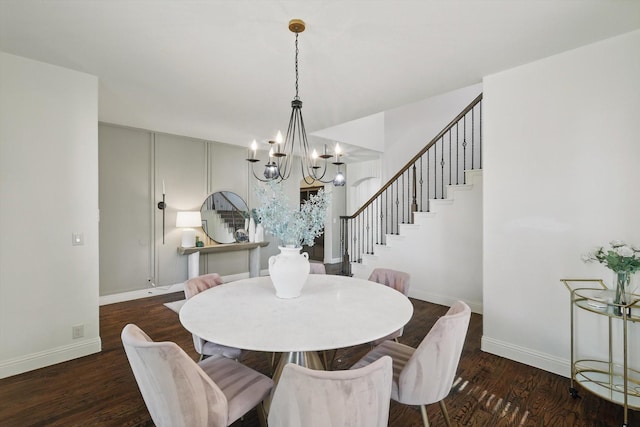 1308 Kittyhawk Dr, Little Elm, TX 75068 - dining area featuring a chandelier, stairway, baseboards, and wood finished floors