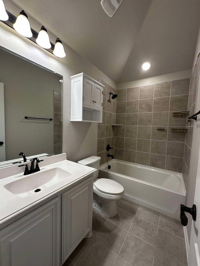1217 Timber Grove Ter, Little Elm, TX 76227 - full bathroom featuring toilet, shower / bathtub combination, vaulted ceiling, tile patterned flooring, and vanity