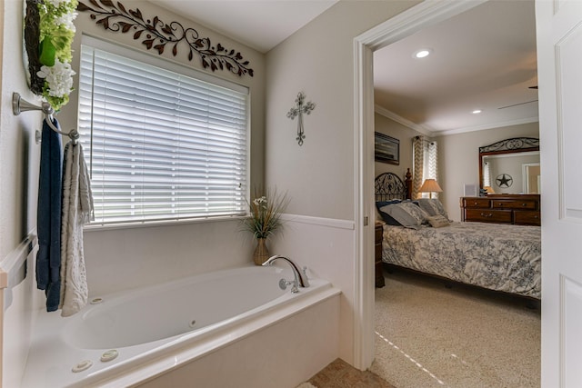 full bathroom with ensuite bathroom, ornamental molding, a garden tub, and a wealth of natural light