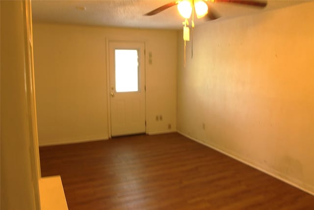 611 E 8th St, Cisco, TX 76437 - unfurnished room with ceiling fan, baseboards, and wood finished floors