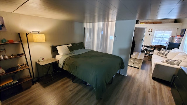bedroom with wood finished floors