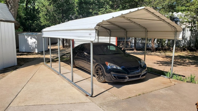 view of parking with a detached carport and a storage unit