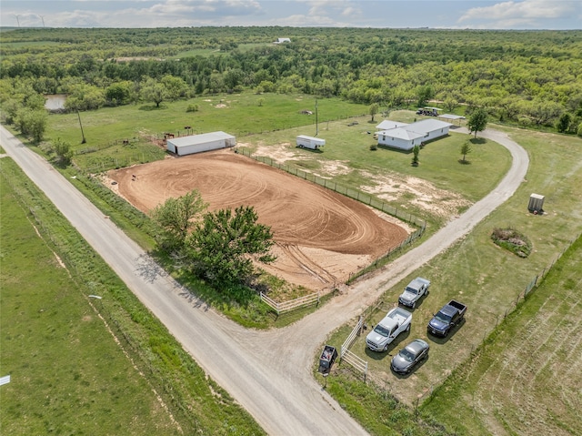 drone / aerial view with a rural view and a wooded view
