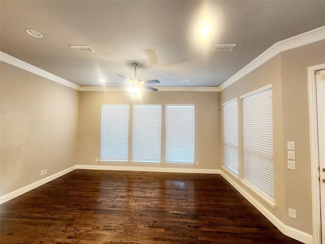 empty room featuring visible vents, ceiling fan, and dark wood-style flooring