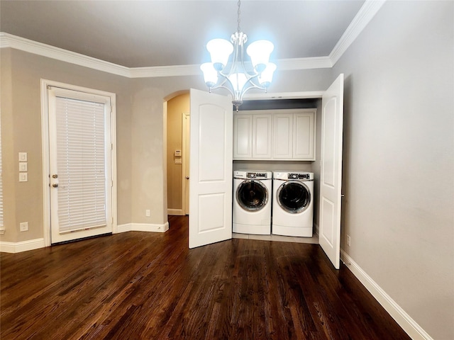 washroom featuring a chandelier, washer and dryer, arched walkways, cabinet space, and dark wood finished floors