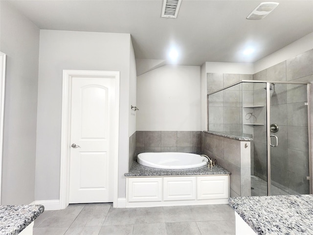 838 Milton Way, Coppell, TX 75019 - full bathroom featuring a bath, a stall shower, and tile patterned flooring