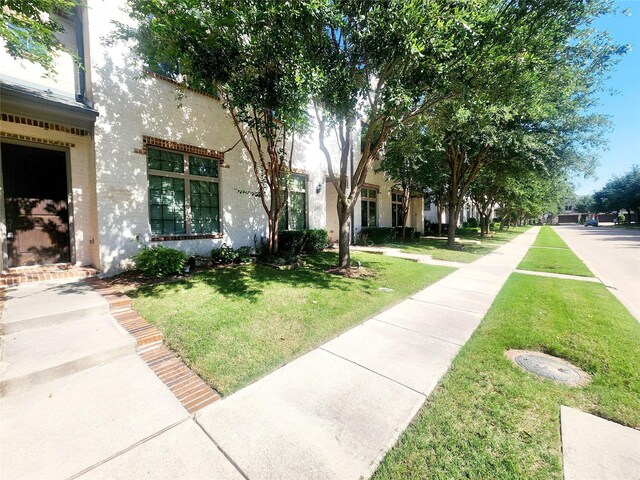 838 Milton Way, Coppell, TX 75019 - surrounding community featuring a lawn