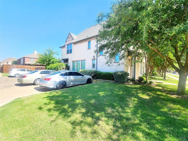 838 Milton Way, Coppell, TX 75019 - view of front of property featuring uncovered parking, stucco siding, and a front lawn